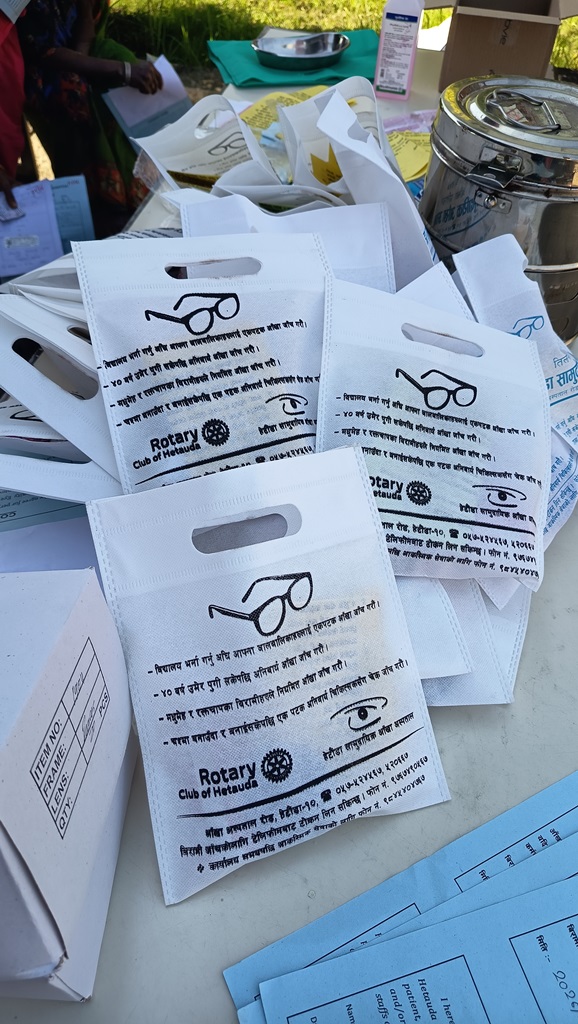 Rotary logo bags distributed to patients undergoing eye treatment